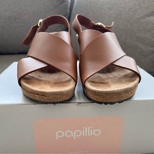 Birkenstock platform in brown with golden buckles